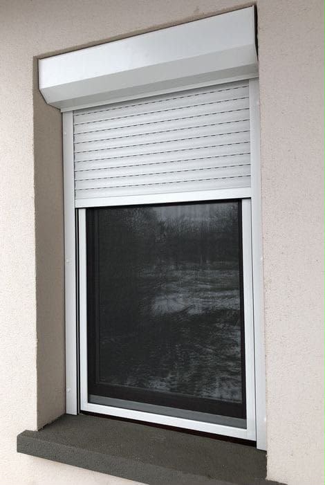 Motorised security roller shutter