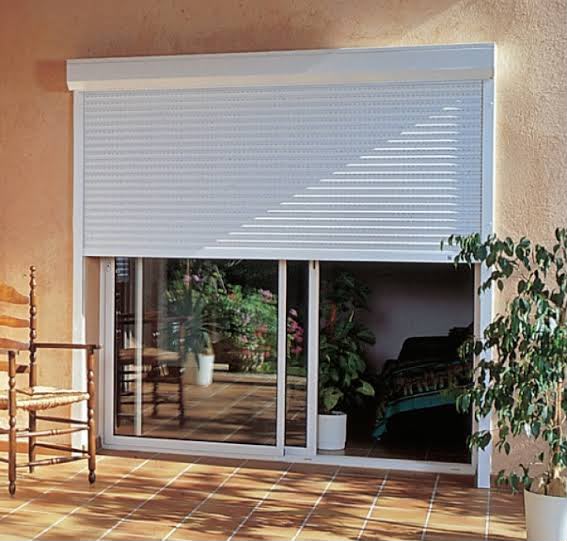 Motorised security roller shutter